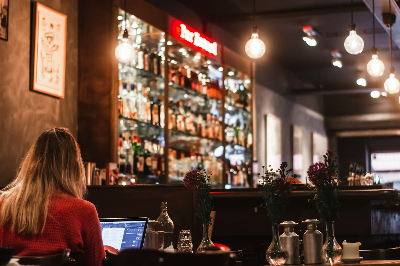 Generic hospitality laptop scene used behind example owner tracking metrics